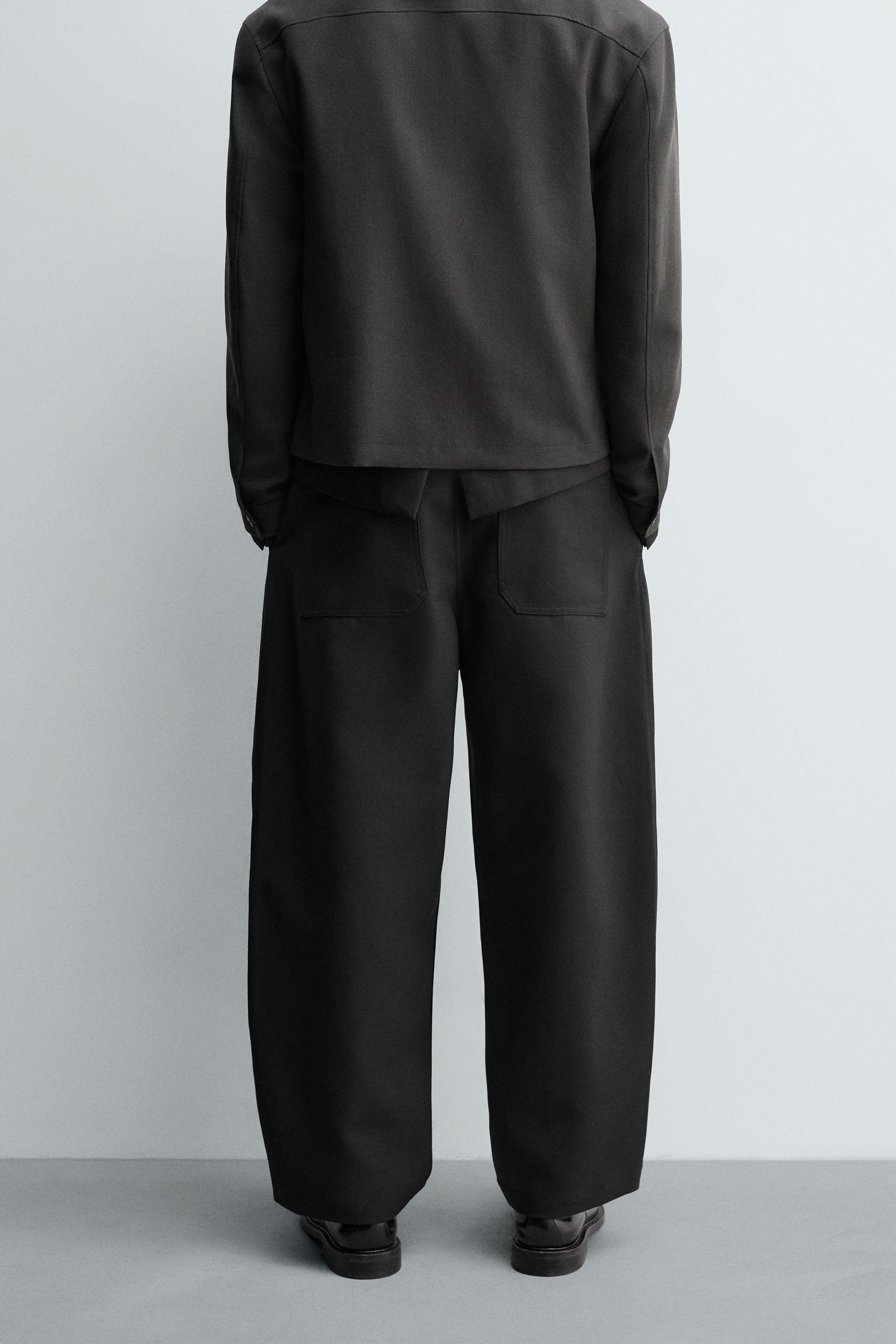 PLEATED BALLOON FIT PANTS